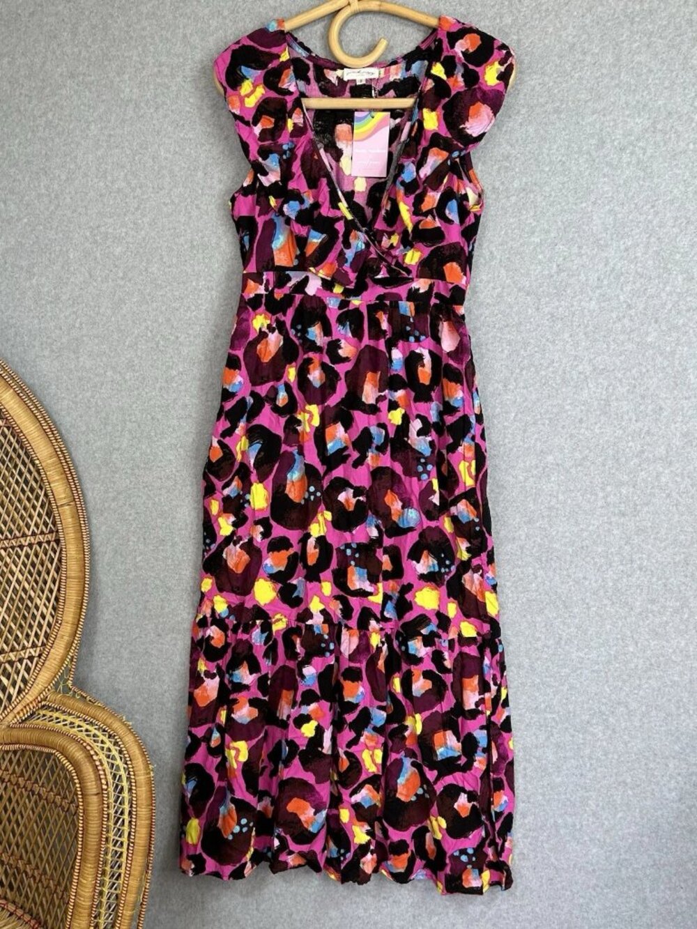 A long dress with a proud sunflower pattern and cocoa-colored print